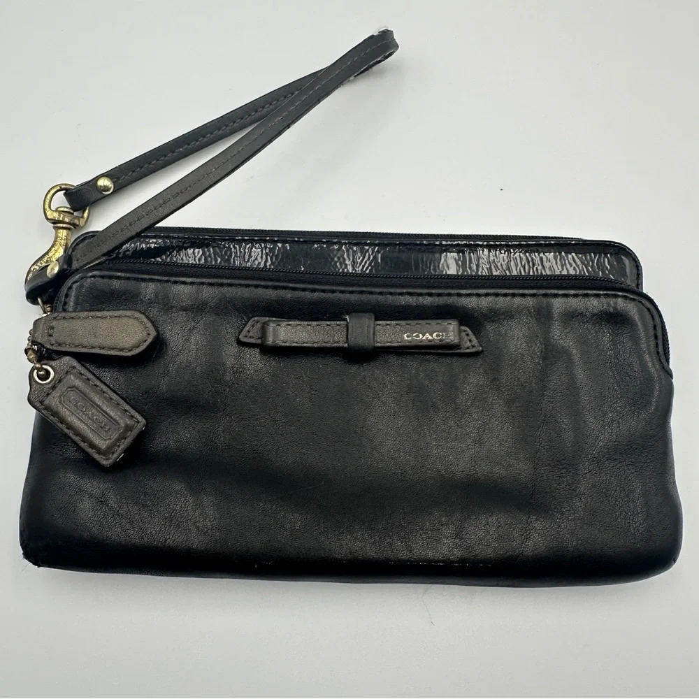 Coach Black Leather Wristlet Wallet With Patent Leather Accent And Bow Detail